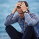 man-in-blue-and-brown-plaid-dress-shirt-touching-his-hair-stockpack-pexels.jpg Man in blue and brown plaid dress shirt touching his hair