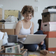 female-shopaholic-with-laptop-shopping-online-in-messy-living-room-stockpack-pexels.jpg Female shopaholic with laptop shopping online in messy living room