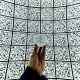 person-holding-clear-glass-ball-with-qr-code-background-stockpack-unsplash.jpg person holding clear glass ball with QR code background