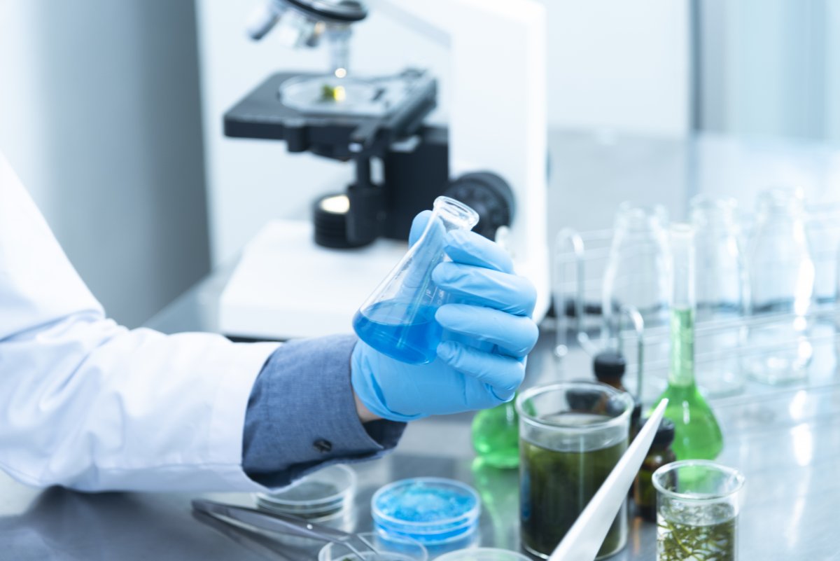 person-holding-laboratory-flask-stockpack-pexels.jpg Person holding laboratory flask