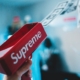 Person holding supreme cash cannon