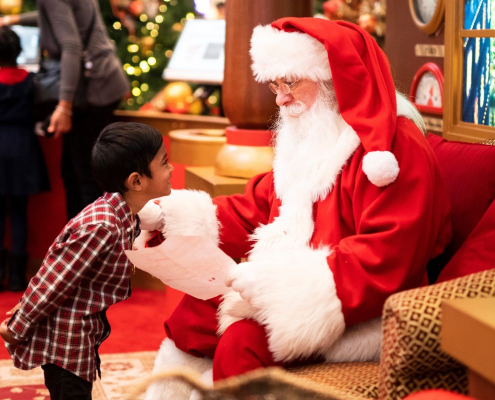 santa-was-reading-a-letter-from-a-kid-stockpack-unsplash.jpg Santa was reading a letter from a kid.
