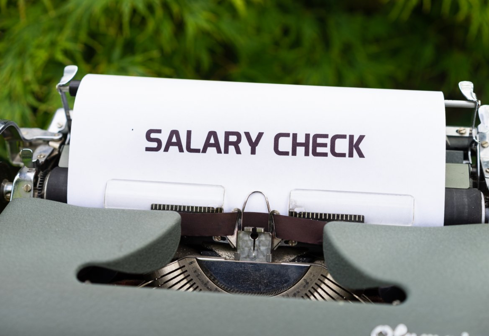 typewriter, salary check, money