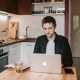 thoughtful-male-student-working-on-laptop-in-kitchen-at-home-stockpack-pexels.jpg Thoughtful male student working on laptop in kitchen at home