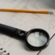 black-magnifying-glass-beside-yellow-pencil-stockpack-pexels.jpg Black magnifying glass beside yellow pencil