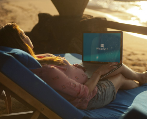 woman-using-gray-laptop-on-beach-stockpack-pexels.jpg Woman using gray laptop on beach