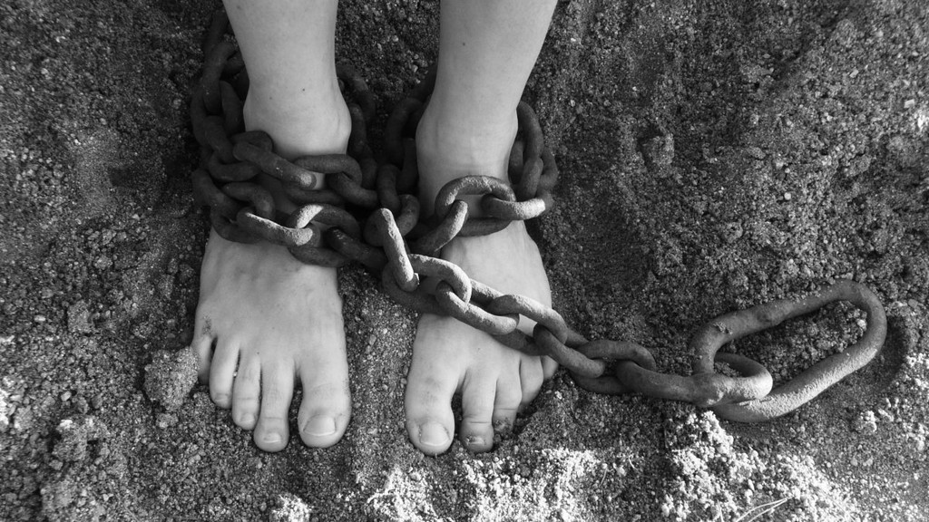chains-feet-sand-stockpack-pixabay.jpg chains, feet, sand