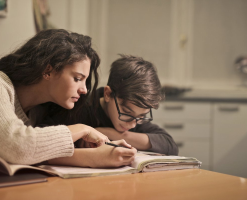 focused-students-doing-homework-at-home-stockpack-pexels.jpg Focused students doing homework at home