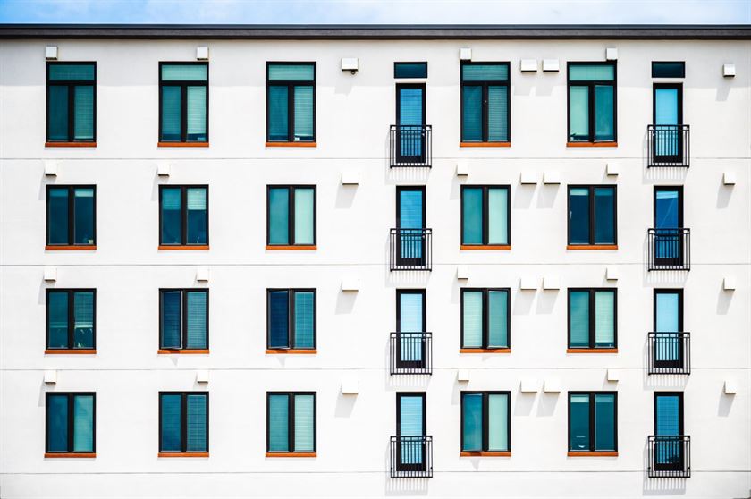 exterior-of-modern-white-residential-condominium-stockpack-pexels.jpg Exterior of modern white residential condominium