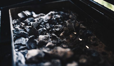 selective focus photography of black charcoal