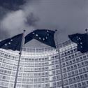 Flags of the European Union in front of the EU-commission building "Berlaymont" in Brussels, Belgium
