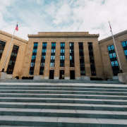 Fed building facade against stairs in city