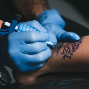 crop-master-making-tattoo-on-leg-stockpack-pexels.jpg Crop master making tattoo on leg