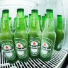 Green heineken bottle in refrigerator