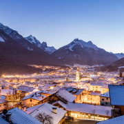 white concrete houses near mountain