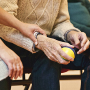 Person holding a stress ball