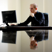 man-sitting-facing-pc-inside-room-stockpack-pexels.jpg Man sitting facing pc inside room