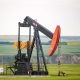a-pump-jack-sits-in-the-middle-of-a-canola-field-on-the-banks-of-the-red-deer-river-valley-stockpack-unsplash.jpg A pump jack sits in the middle of a Canola Field on the banks of the Red Deer River valley.