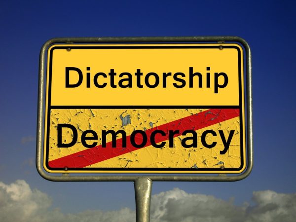 democracy, dictatorship, place-name sign