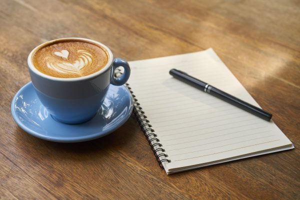 coffee, pen, notebook