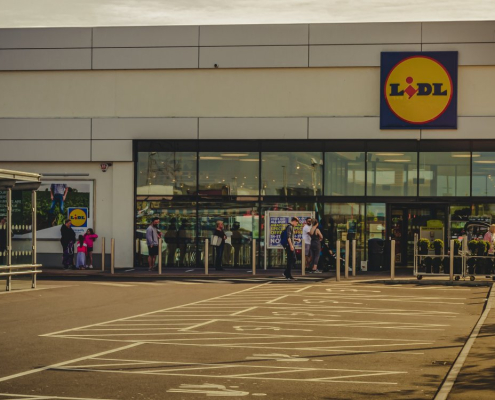 customers-maintain-social-distancing-while-queuing-to-enter-a-grocery-store-that-is-operating-a-one-in-one-out-policy-when-they-reach-a-certain-capacity-during-the-covid-19-pandemic-stockpack-unsplash.jpg Customers maintain social distancing while queuing to enter a grocery store that is operating a one-in-one-out policy when they reach a certain capacity during the Covid-19 pandemic.
