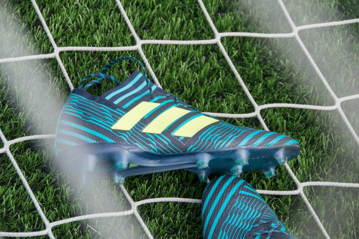 Football cleats in the net.