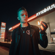 man-in-black-zip-up-jacket-standing-near-red-and-white-building-during-nighttime-stockpack-pexels.jpg Man in black zip up jacket standing near red and white building during nighttime