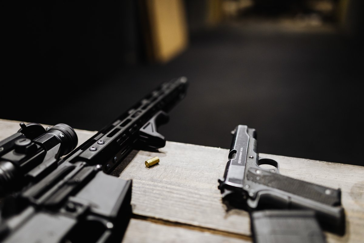 a-rifle-and-a-handgun-on-a-desk-stockpack-pexels.jpg A rifle and a handgun on a desk