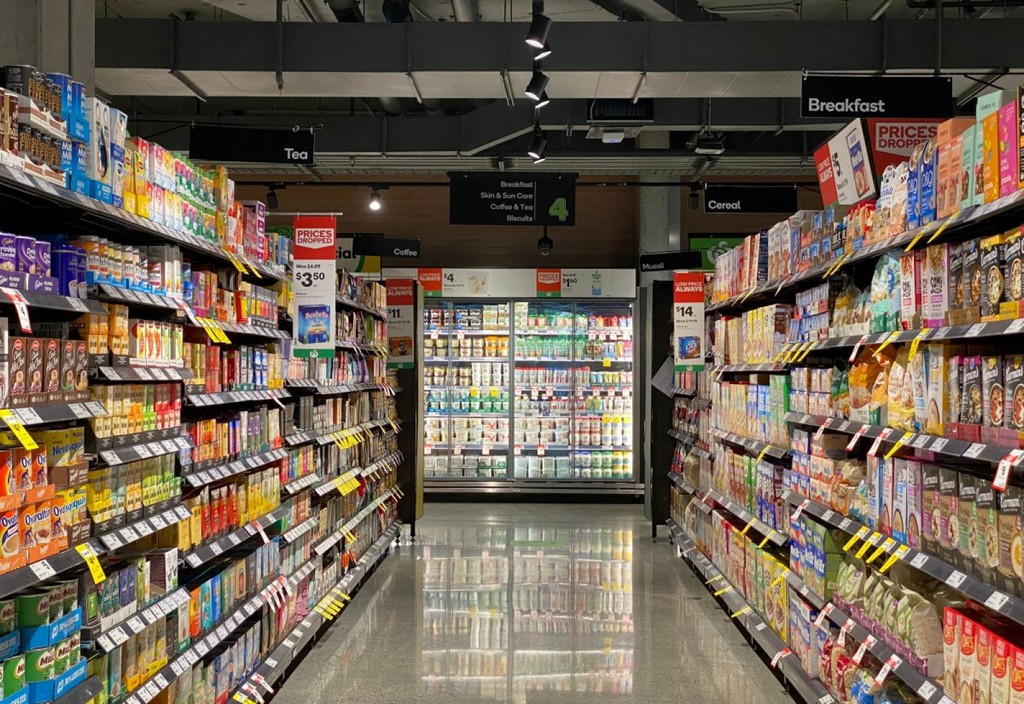 aisle, food, cheese, dairy refrigeration, cookies, biscuit, cereal, tea, coffee, yogurt, almond, rice, soy milk rice, spice, sauce, cereal, quick milk, store shelf shelf,  store, supermarket, supermarket aisle