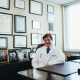 Doctor sitting in front of his desk