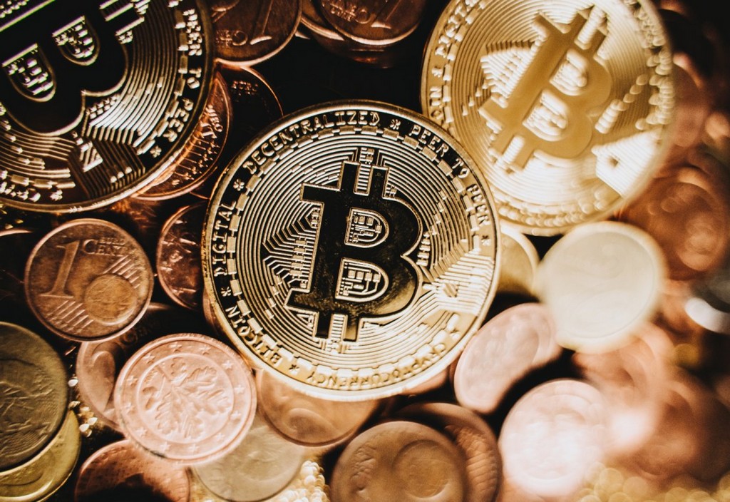 Gold coins in close up photography