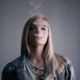 a-twenty-four-year-old-young-woman-blowing-smoke-after-using-her-e-cigarette-stockpack-unsplash.jpg A twenty-four year old young woman blowing smoke after using her e-cigarette.