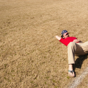 man-in-red-top-lying-on-lawn-field-during-daytime-stockpack-unsplash.jpg man in red top lying on lawn field during daytime