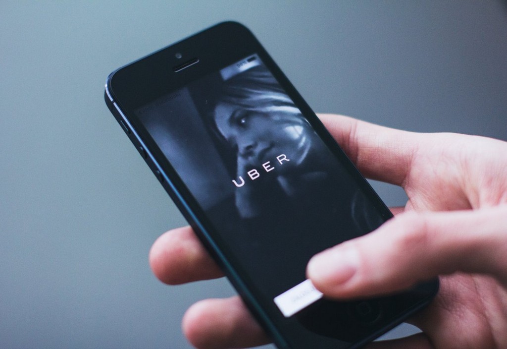 person-holding-smartphone-stockpack-pexels.jpg Person holding smartphone
