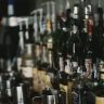 Selective focus photography of assorted brand liquor bottles