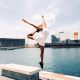 woman-jumping-in-mid-air-near-body-of-water-during-daytime-stockpack-unsplash.jpg woman jumping in mid-air near body of water during daytime