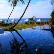 swimming pool, ocean, palm trees
