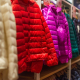 Assorted color bubble jackets hanged