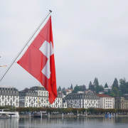 red-and-white-flag-on-pole-near-body-of-water-during-daytime-stockpack-unsplash.jpg red and white flag on pole near body of water during daytime