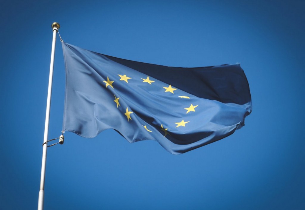 european-union-flag-flying-in-front-of-bright-blue-sky-stockpack-unsplash.jpg European Union flag flying in front of bright blue sky