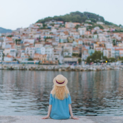 back-view-of-woman-in-blue-dress-sitting-on-the-shore-stockpack-pexels.jpg Back view of woman in blue dress sitting on the shore