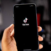 person-holding-an-iphone-running-tiktok-stockpack-unsplash.jpg Person holding an iPhone running TikTok