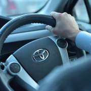 a-person-holding-a-steering-wheel-stockpack-pexels.jpg A person holding a steering wheel