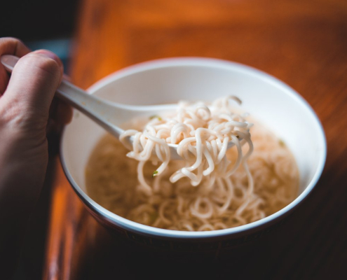 Closeup on instant noodles on spoon