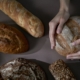 Person holding brown bread