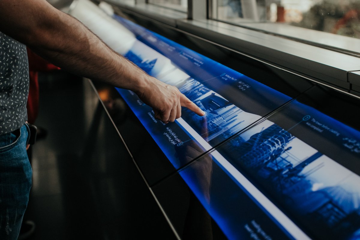 adult-man-pointing-with-hand-finger-to-the-touchscreen-with-information-stockpack-unsplash.jpg Adult man pointing with hand finger to the touchscreen with information