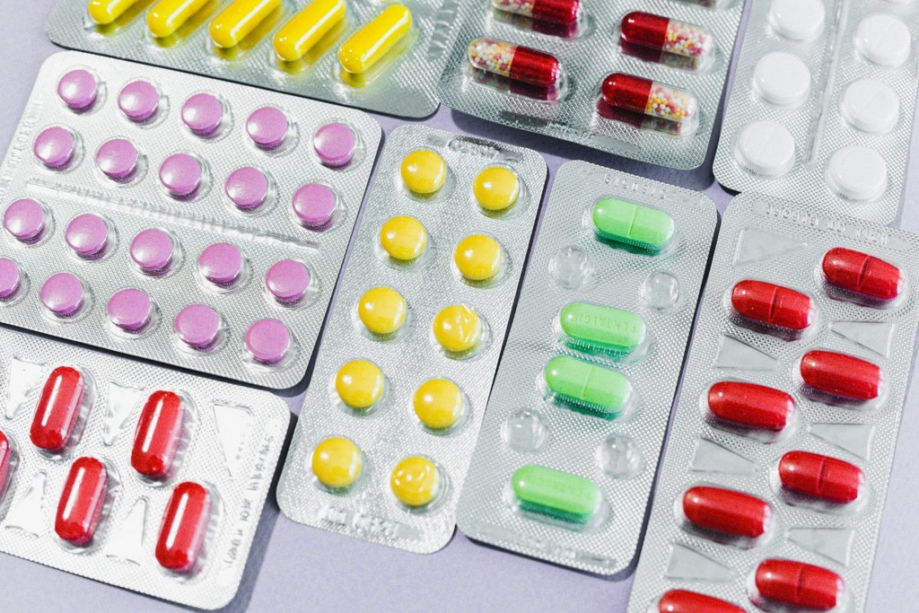 Assorted colorful pills in blister packaging