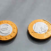 Coins one euros lying on gray table