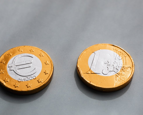 Coins one euros lying on gray table