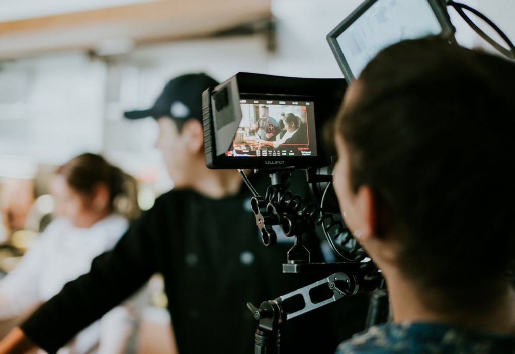 man-recording-the-scene-stockpack-pexels.jpg Man recording the scene